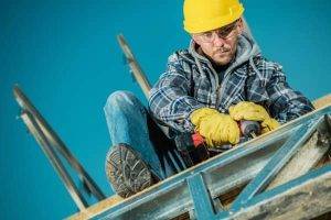 commercial roof maintenance worker