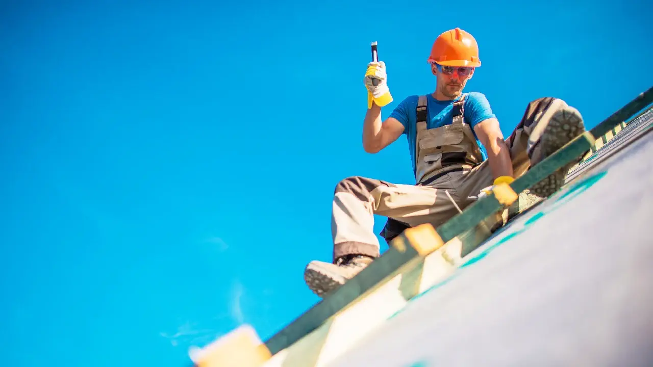 A professional roofer examines a residential roof for maintenance purposes, essential for Houston homeowners' roof care
